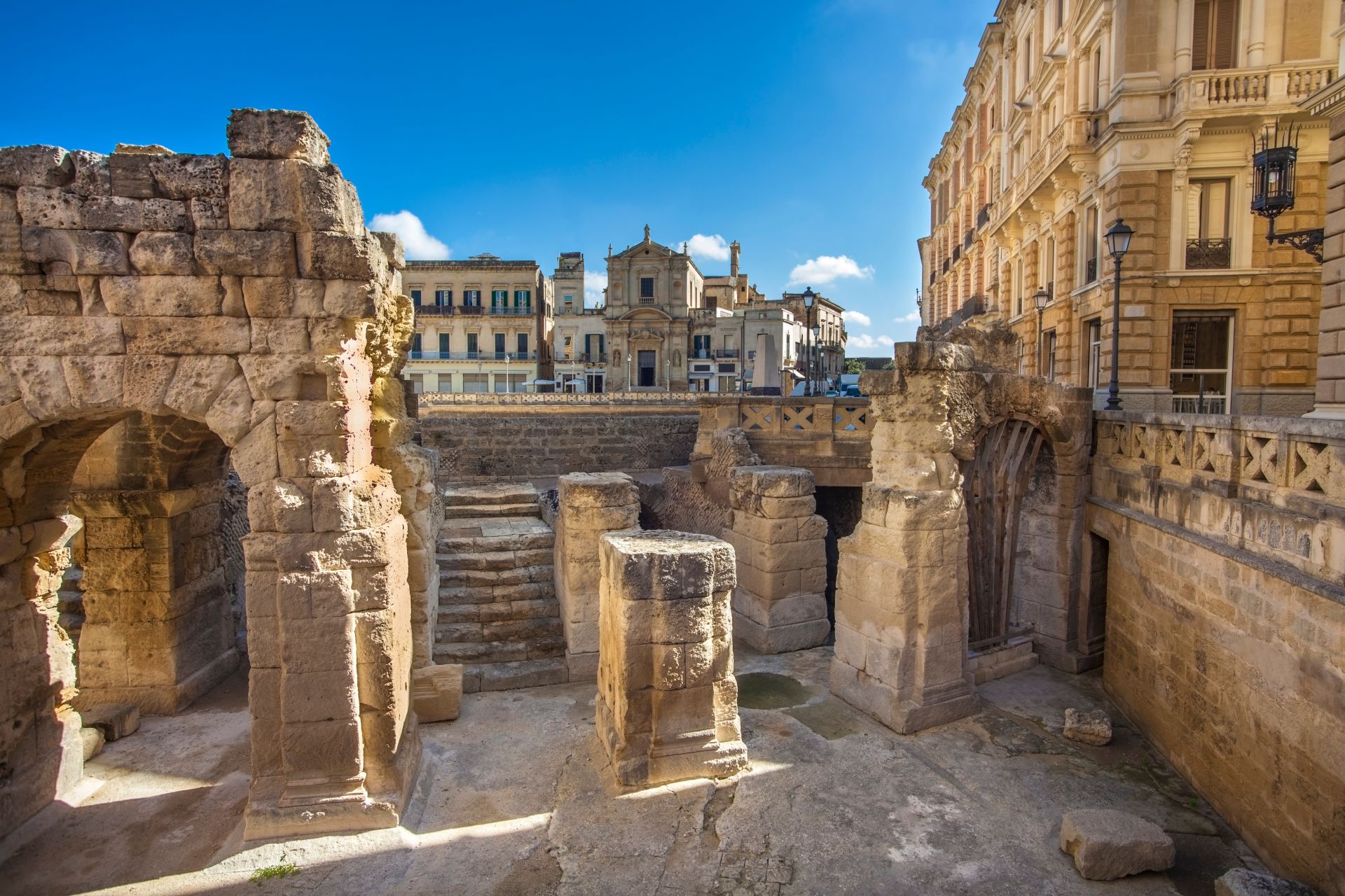 At-the-Roman-amphitheater-in-Piazza-SantOronzo-in-Lecce-Apulia-Italy