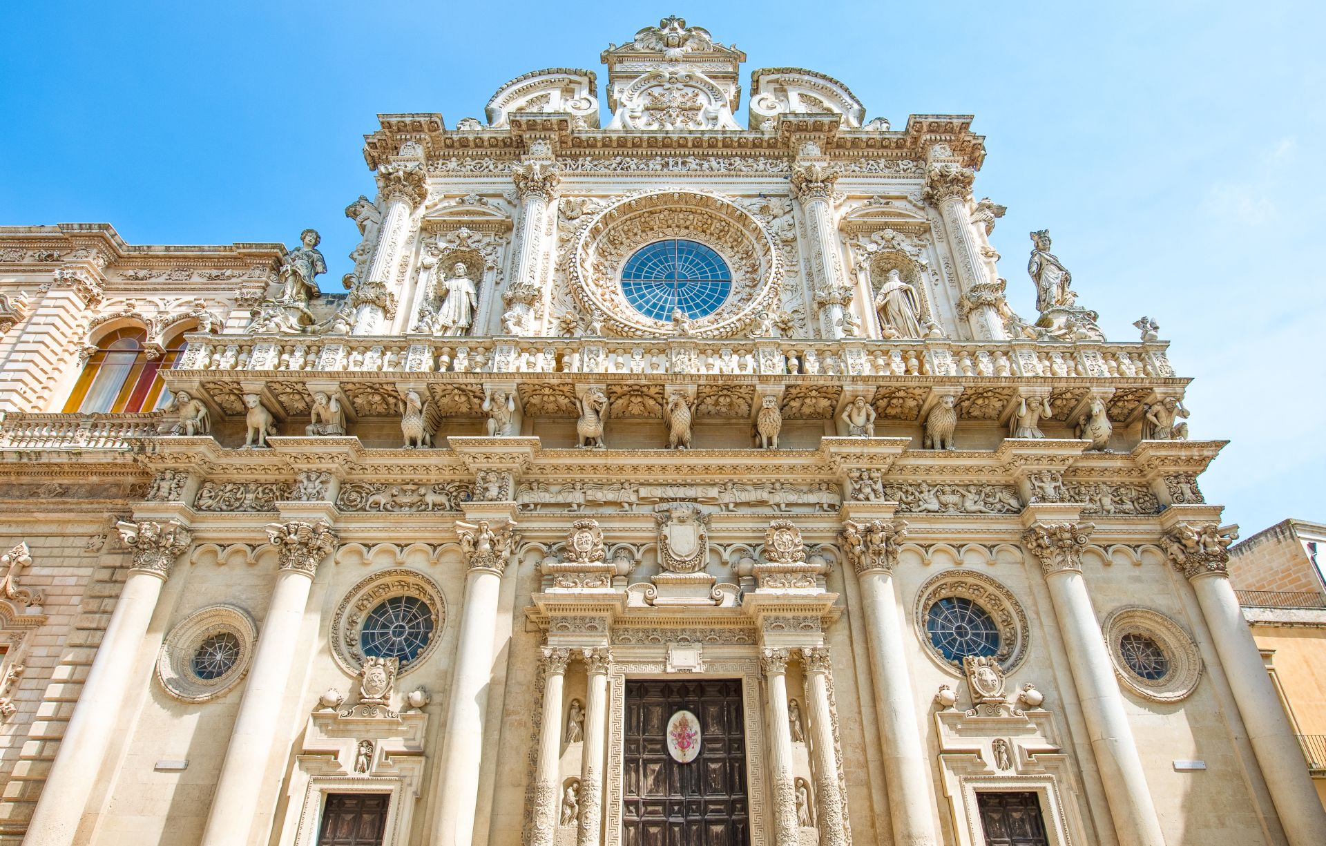 The-full-of-sculpture-facade-of-the-Santa-Croce-Basilica-Lecce-Italy