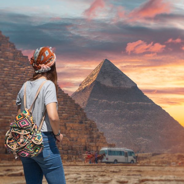 EGYPT Woman,Tourist,Walks,On,The,Background,Of,The,Pyramids,In