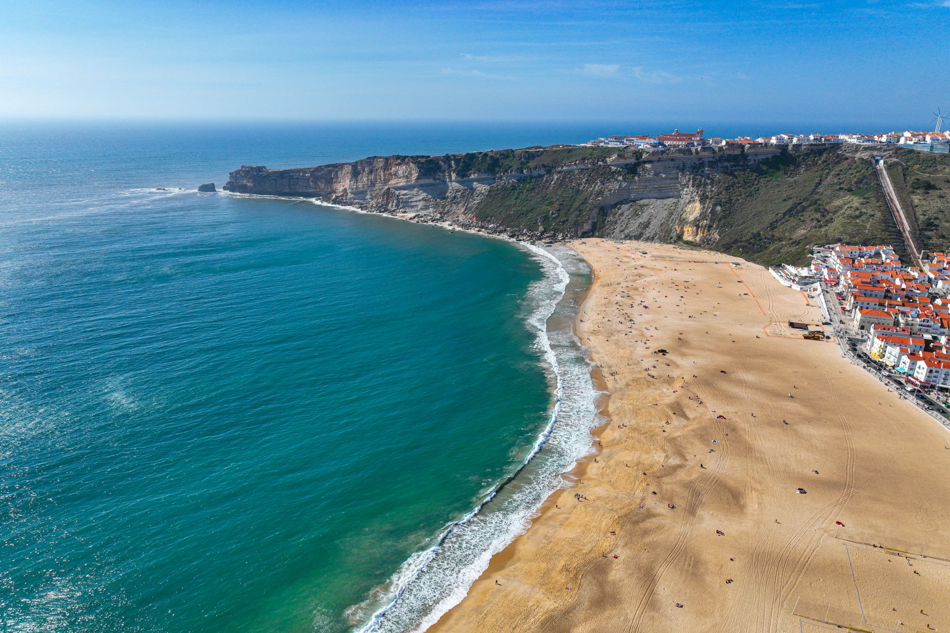 Long stretch of Nazare coastline and marina