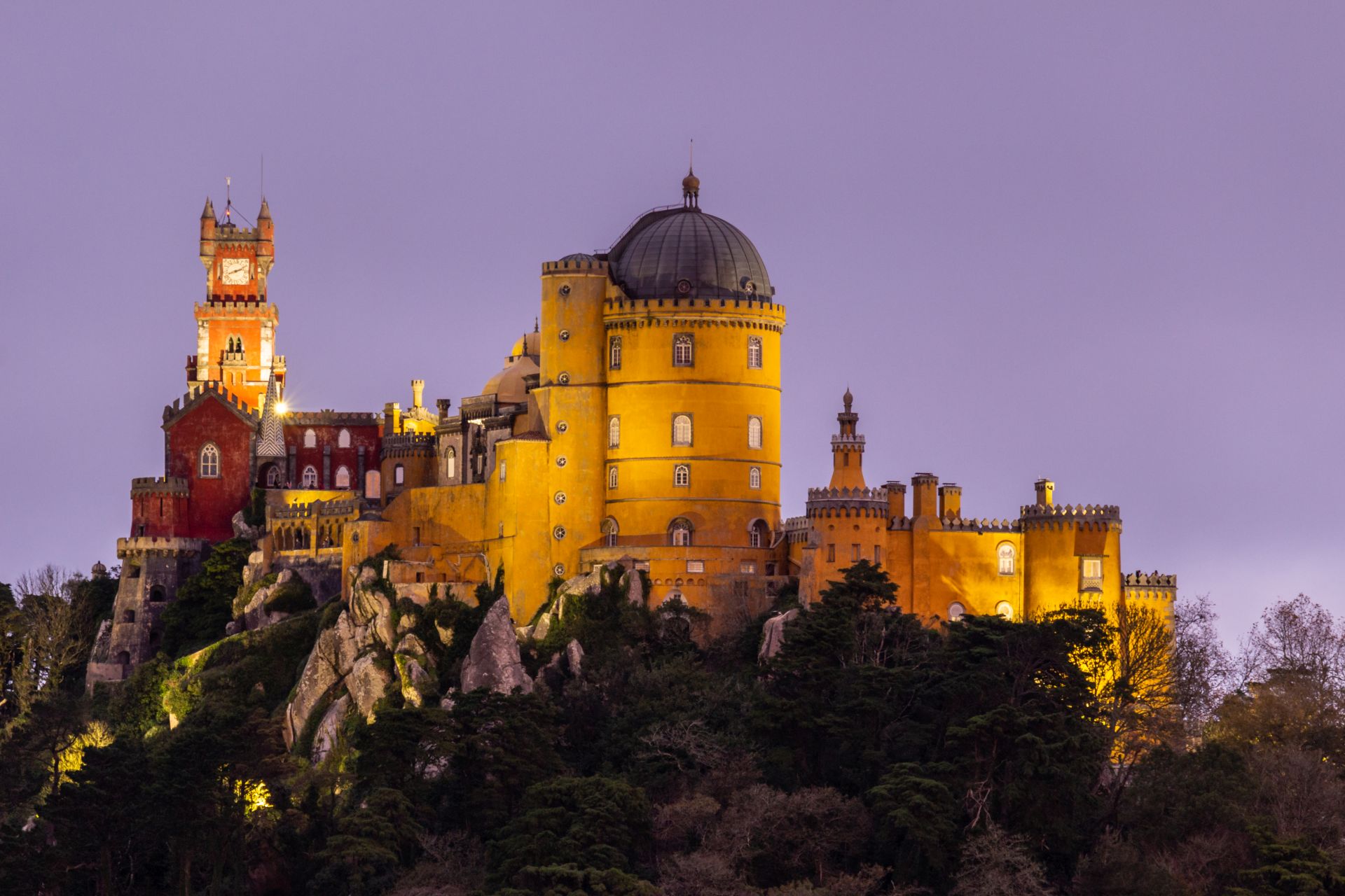 Illuminated Pena Palace in Sintra at Evening Twilight. Portugal