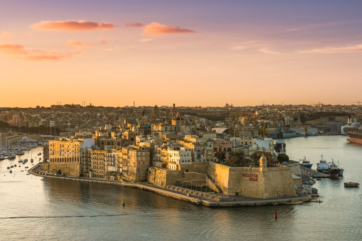 Senglea at sunrise in morning light with port